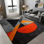 tapis géométrique moderne noir gris orange antidérapant facile nettoyer triangles cercle salon chambre