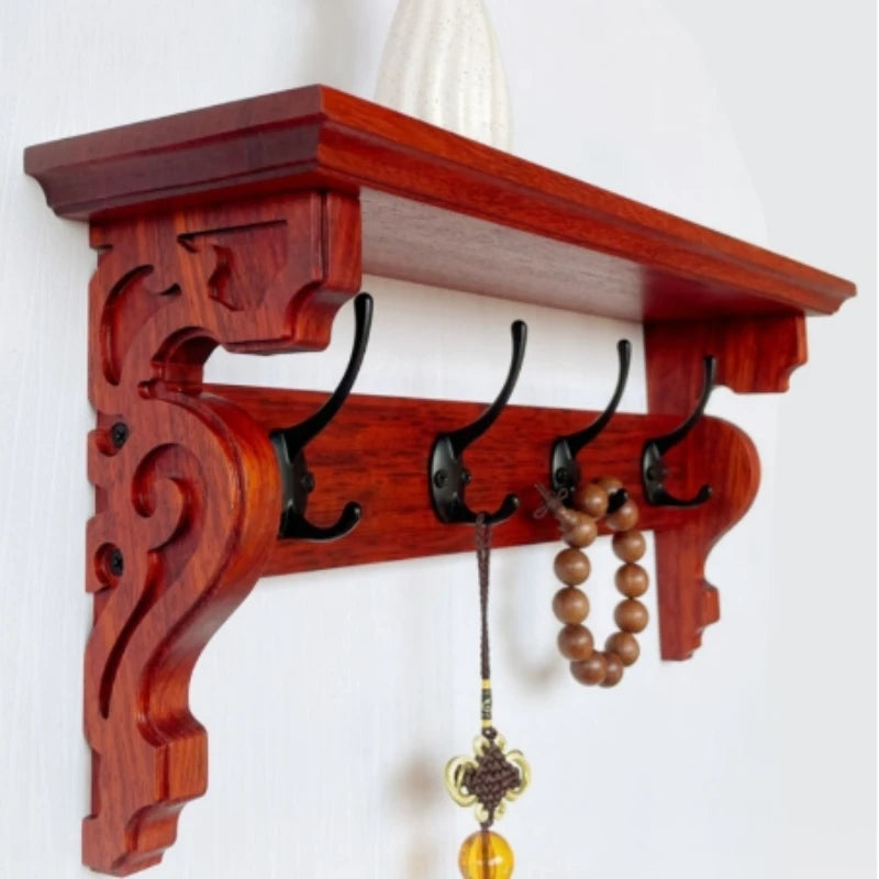 porte manteau étagère murale bois marron foncé crochets décor sculpté motifs floraux classique vis