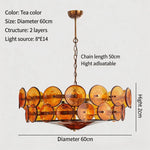 suspension lumineuse moderne élégante verre orange rond translucide chaîne métallique