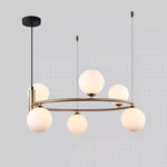 suspension luminaire moderne sphères verre translucides anneau métal doré salon chambre scandinave