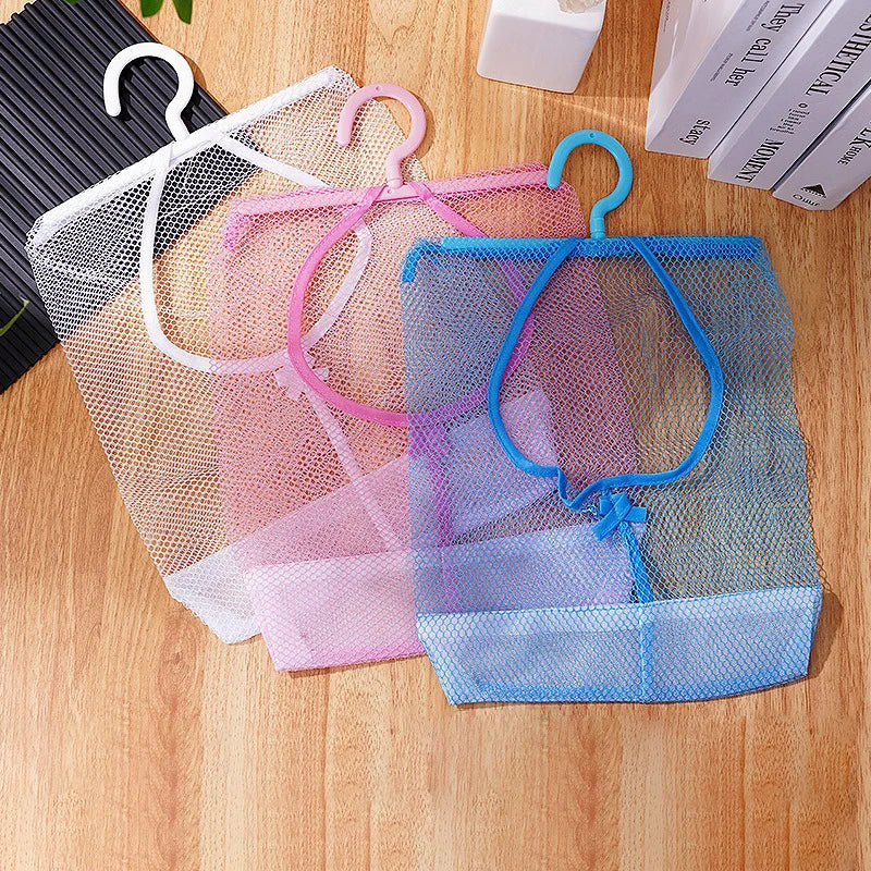 organisateur suspendu bain blanc rose bleu maille alvéolée minimaliste utilitaire