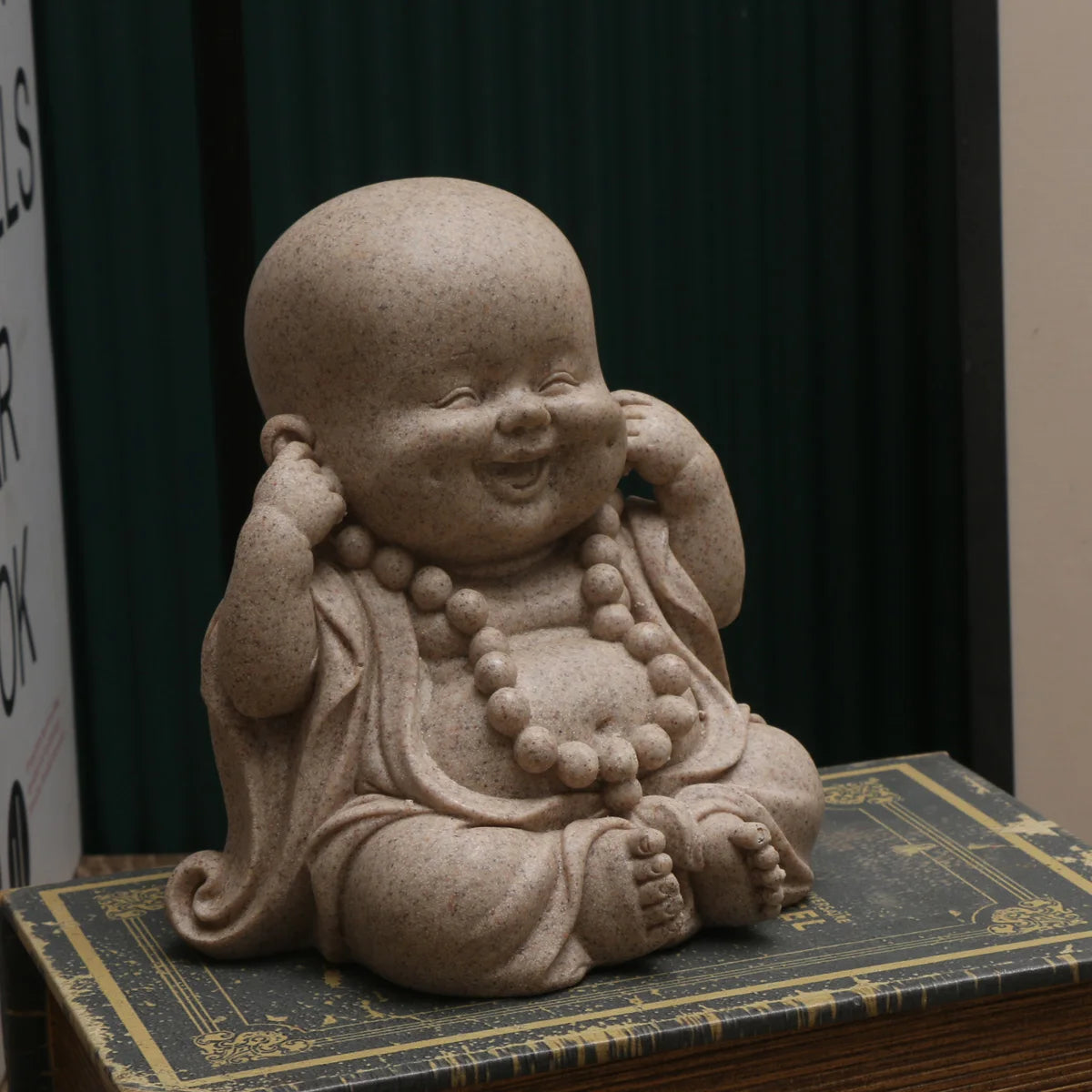 statuettes bouddha enfant résine beige clair marron motifs dorés zen