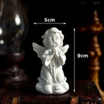 statuette ange résine blanche classique livre coquillage ornement sans odeur sculpteur fée