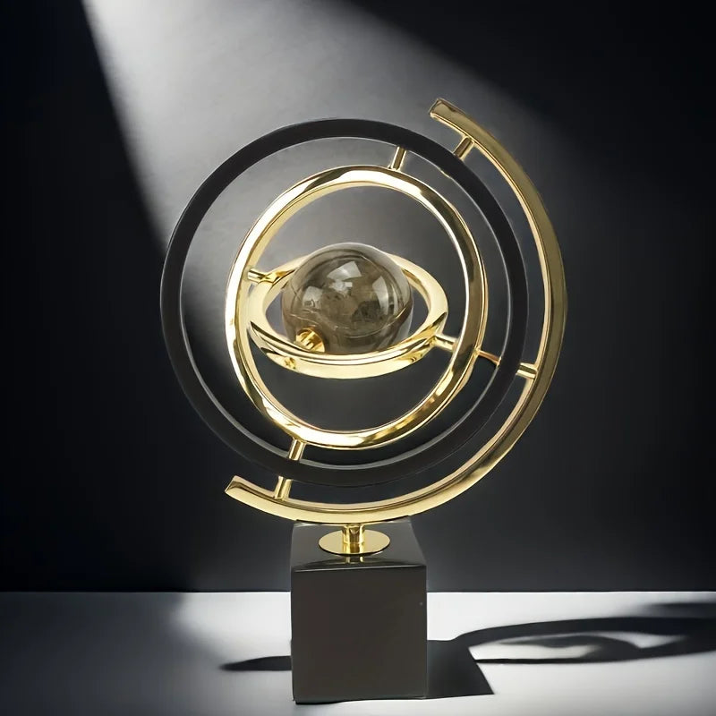 sphère artificielle moderne marbrée dorée noire décoration intérieure base carrée geometrique