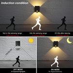 Applique murale LED allumée en blanc chaud la nuit