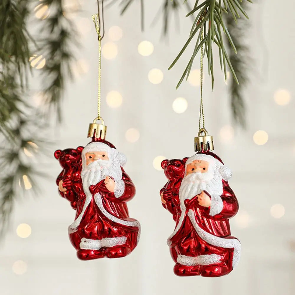 Comparaison des deux pièces de décoration suspendue hibou Père Noël rouge et blanc