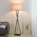 lampe sol moderne abat jour tissé structure géométrique noir doré led minimaliste