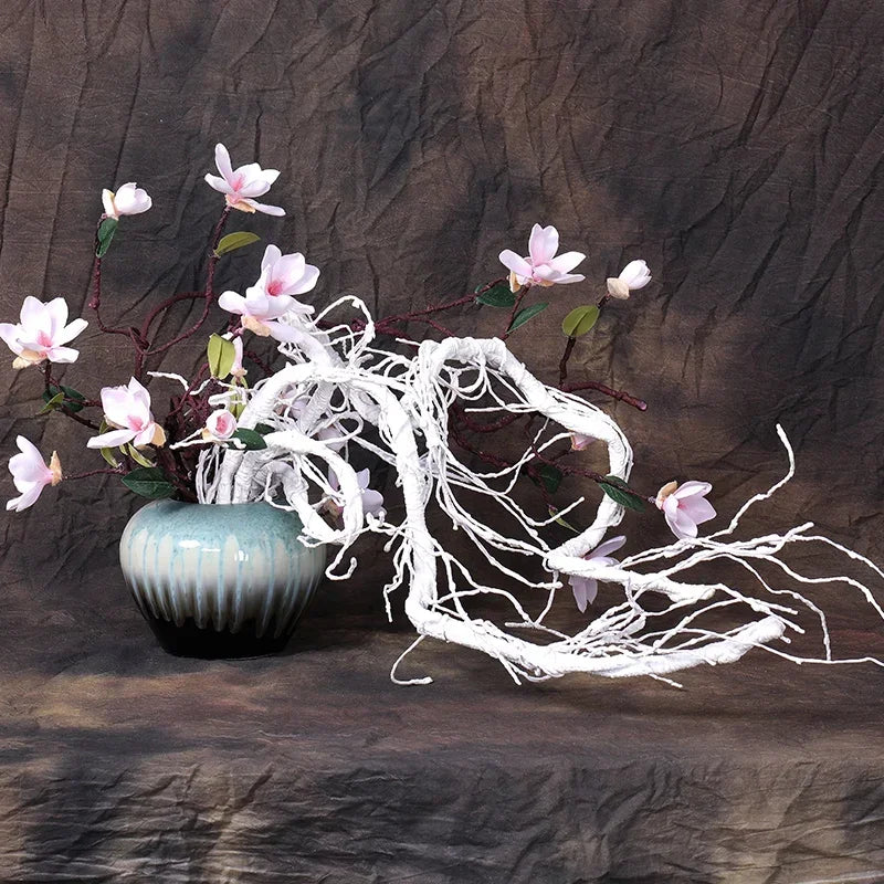décoration murale branches artificielles brunes fleurs roses paniers osier naturel