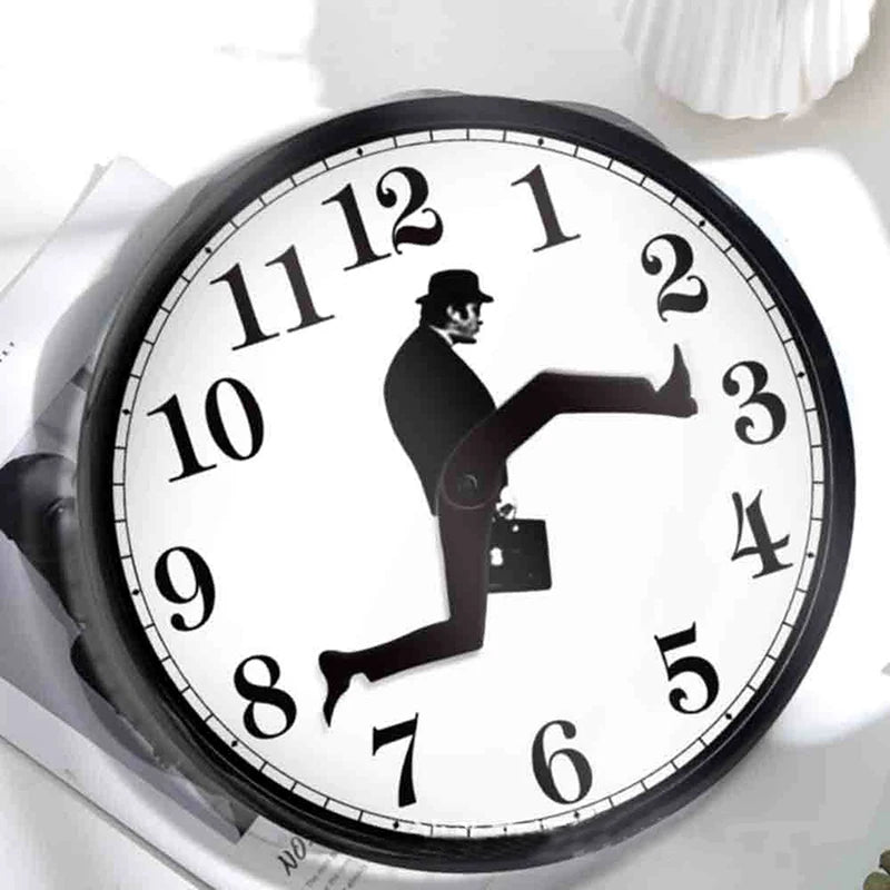 horloge murale moderne cadre noir fond blanc motif homme costume