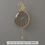 horloge murale moderne or bleu cerf décoration festive salon round métal doré