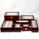 boîtes montres marron foncé compartiments classiques poignées dorées écologiques rangement voyage