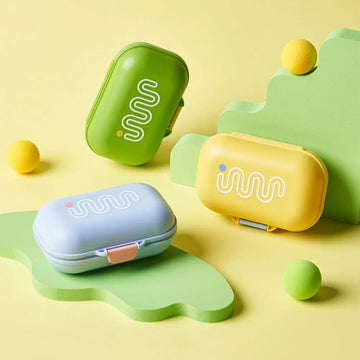 boîtes rangement modernes couleurs vert jaune bleu clair motif géométrique opaques cliquables salle bains