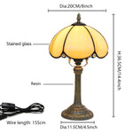 lampe table art déco bronze beige translucide motifs géométriques verre teinté base solide chambre