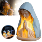 statue vierge marie prière lumière bleu blanc décor religieux table meuble bibliques bougies croix
