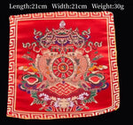 serviettes traditionnelles multicolores brodées motifs floraux géométriques opaques