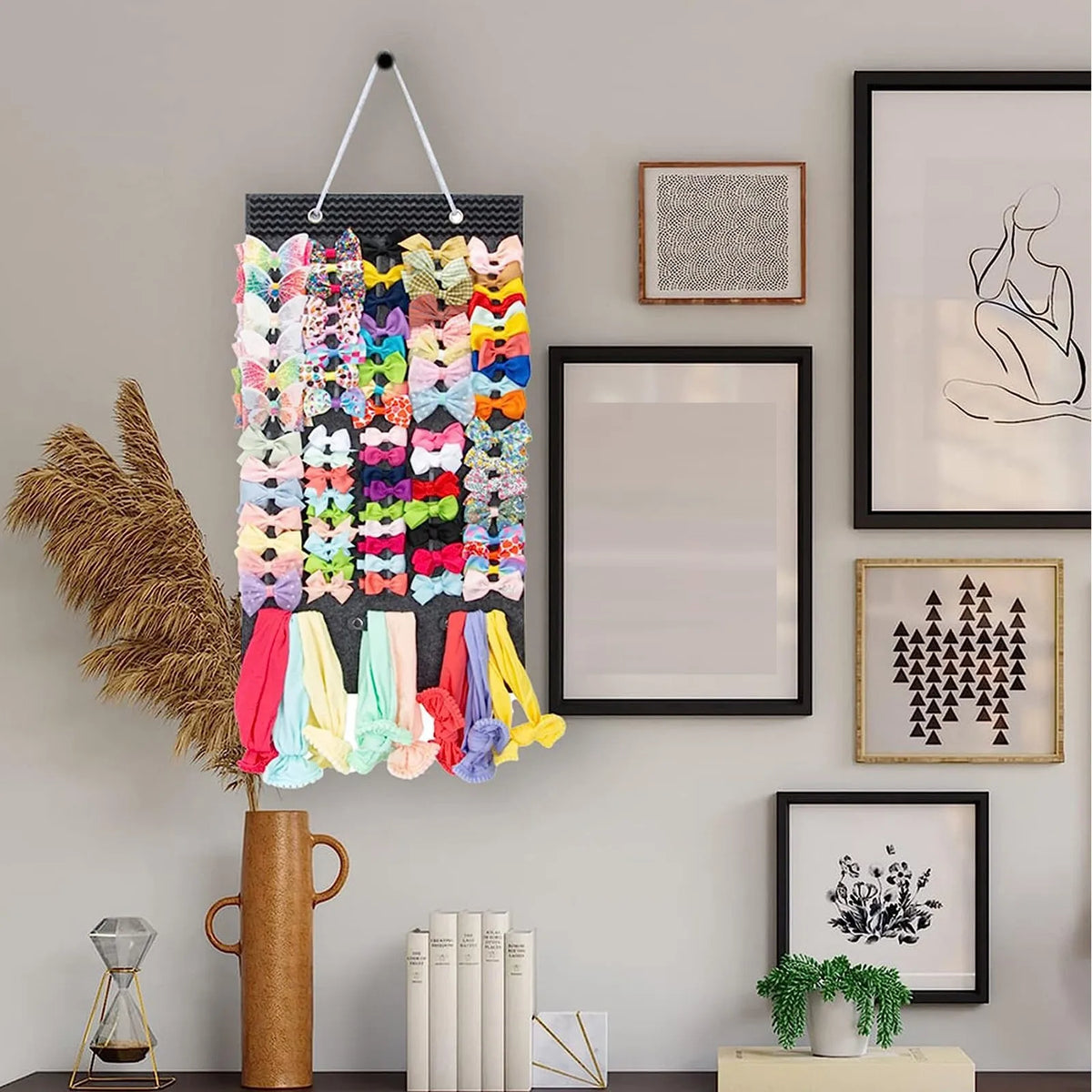 organisateur suspendu bows rangement tête rubans headbands rose noir tissu texturé vertical compartments