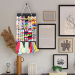 organisateur suspendu bows rangement tête rubans headbands rose noir tissu texturé vertical compartments