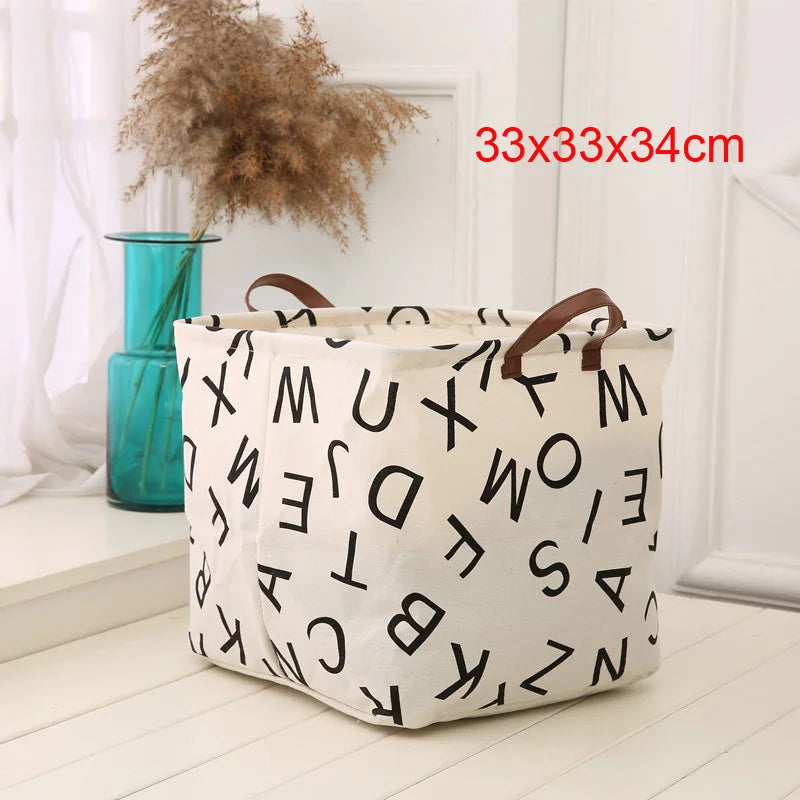panier rangement pliant lin blanc noir rayures lettres poignées cuir moderne