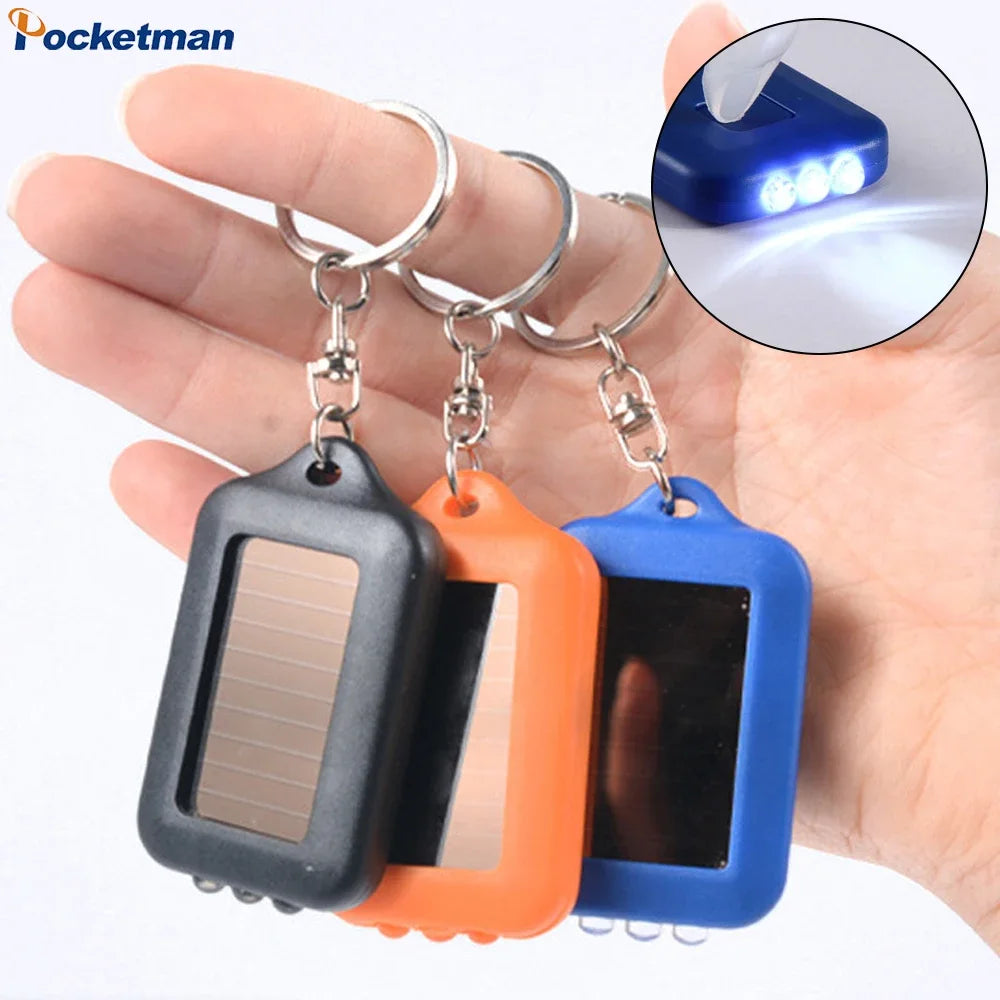 lampe torche solaire portable résistante autodéfense recharge solaire anneau clé rouge bleu orange