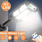 lampe solaire extérieure led rechargeable moderne noire télécommande vis