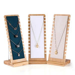 présentoir bois colliers pendentifs chaînes organisation bijoux moderne différents motifs argenté doré