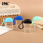 bouteilles rechargeables transparentes modernes couleurs variées anneaux boucles pratique mini désinfectant main cosmétique alcool