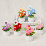 bouquet artificiel fleurs feuilles couleurs variées blanc rouge orange violet vert intérieur décoration festive