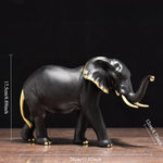 statues éléphants résine blanc noir or détails dorés classique élégant animal compagnie feng shui