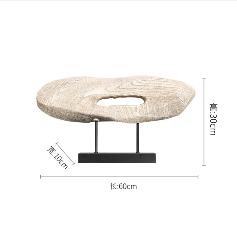 sculpture décorative moderne résine texturée trou central minimaliste socle métallique beigeclair noircerne
