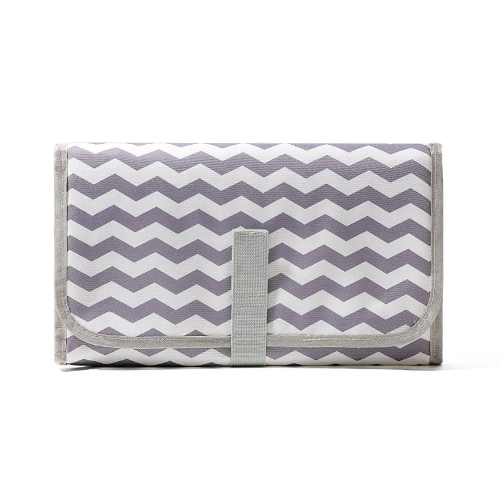 tapis changement portable bébé motif animalier blanc gris bleu