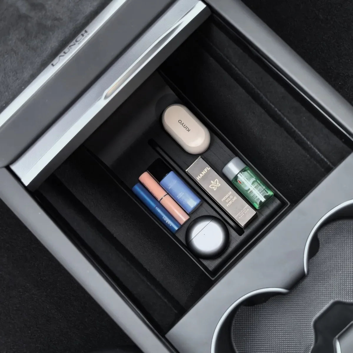 organisateur console centrale noir texturé bacs rangement minimaliste moderne accessoires voiture