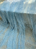 tissu dentelle broderie bleu clair élégant translucide polyester nylon large