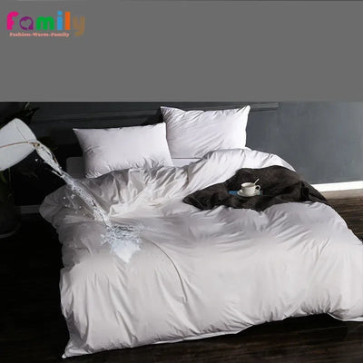 Housse de couette imperméable blanche 2 pièces sur lit 1 personne