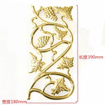 ornement métallique doré floral art nouveau baroque fixations invisiblesextérieur maison deco porte fleuri geometrique