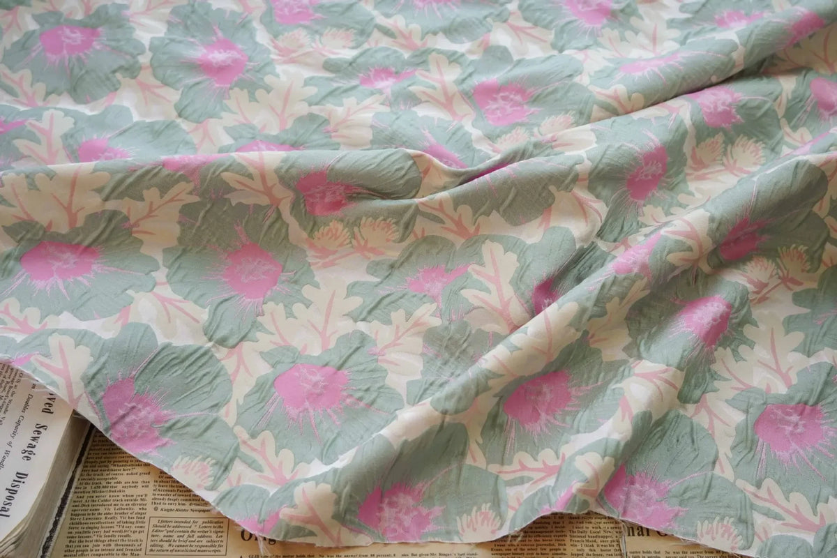 tissu imprimé fleurs vert pastel rose clair polyester moderne largeur 155cm opacité respectueux environnement
