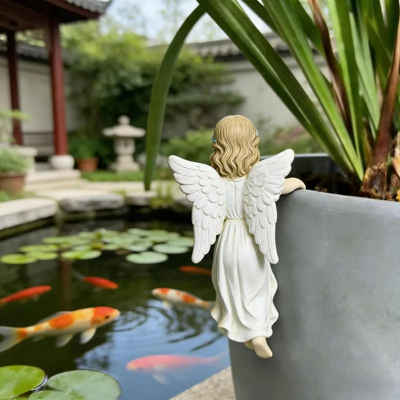 statue décorative résine ange pot fleurs suspendu jardin plantes verte bassin poissons carpes koï