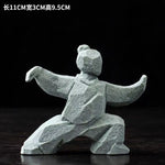 statues arts martiaux traditionnelles gris clair texture granite opaques artisanal modernes motifs traditionnels