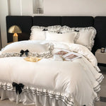 Taies d'oreiller assorties à la housse de couette blanche