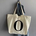 sac main femme toile beige clair lettre noire poignées détachables