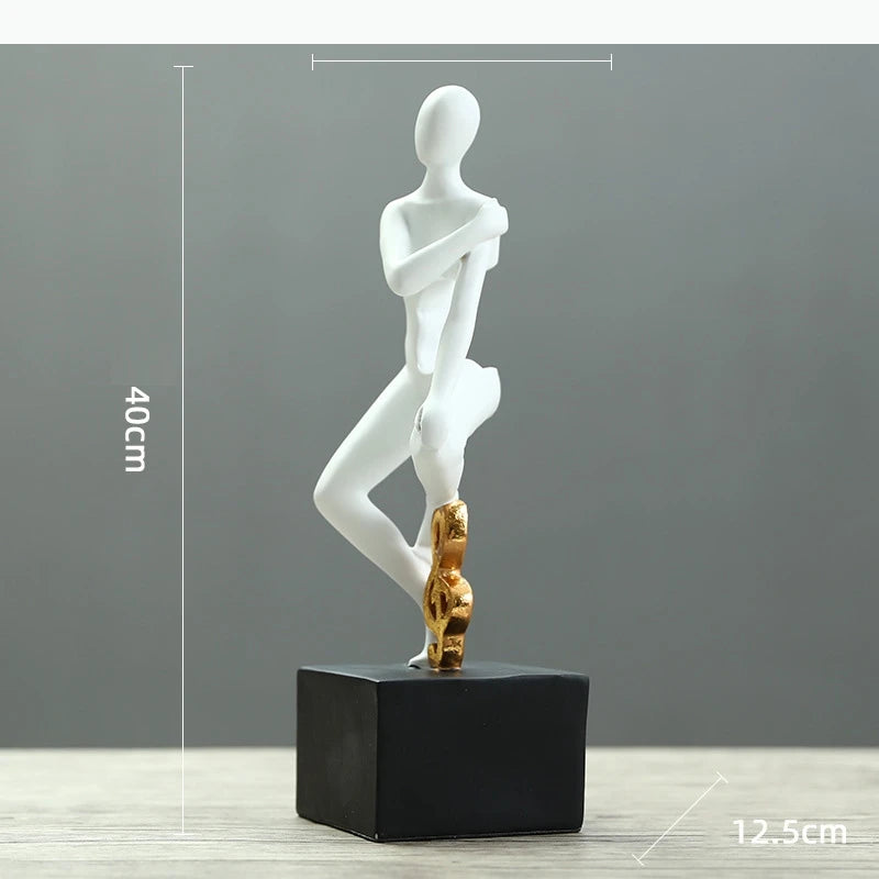 statues décoratives minimalistes figures humaines stylisées blanc noir élément doré moderne abstrait