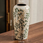 vases céramique vintage fleurs classiques blanc vert beige bruns intérieur salon bibliothèque