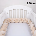 coussin noué bébé tissu doux texture tressée beige clair moderne confortable sécurité chambre anti