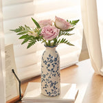 vases decoratifs ceramic bleu blanc motifs floraux salon deco