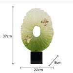 sculpture décorative moderne papillon vert doré motifs floraux contemporaine élégante base noire