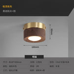 lampe moderne or noir bois brillant éclairage quotidien monté surface minimaliste