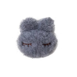 porte plaid peluche rose clair gris yeux fermés doux anti dérapant fixateur couette