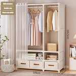 armoire vêtements moderne blanche rangées tiroirs compartiments rideau paires vêtements suspendus panier ours tasse