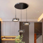 suspension lumineuse moderne trois abat jours argentés abat jours transparents éclairage led salon chambre