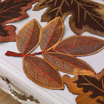 nappe automnale feuilles brodées citrouilles glands rustique chic semi transparent