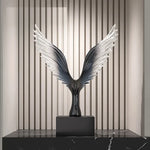 sculpture oiseau moderne minimaliste noir argenté plumes stylisées transparent salon